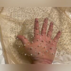 Nude color mesh, beaded top. I did my best to get a photo of the detail!